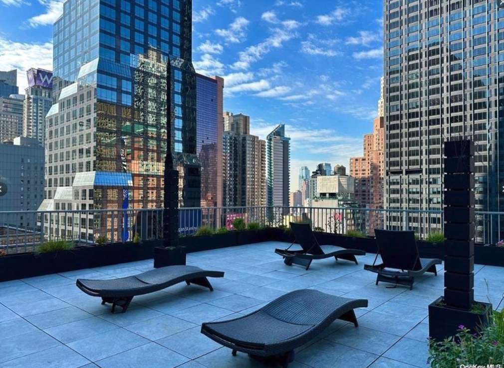 Outdoor terrace overlooking New York City buildings